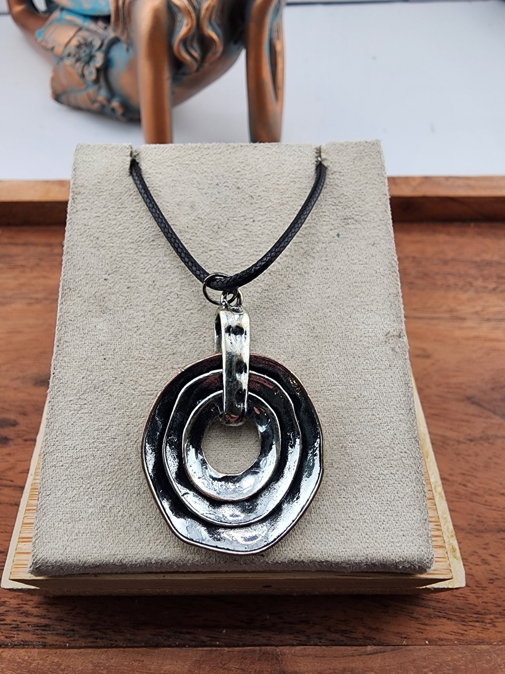 Layered Concentric Silver Pendant Necklace in Black Cord